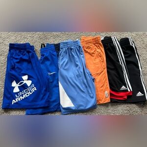 Lot of boys name brand athletic shorts. See description for sizing.